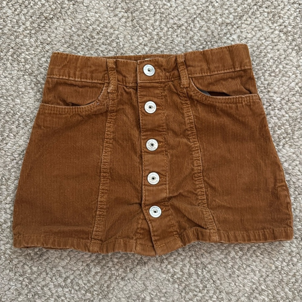 Girls camel corduroy skirt with snap button closure and pockets